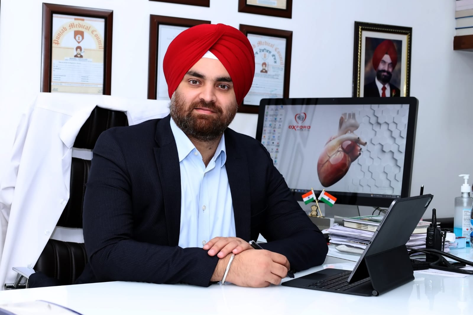 Dr. Gurbir Singh Gill in his consulting room